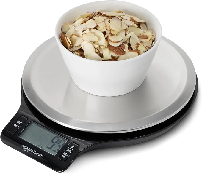 Digital kitchen scale used to weigh fish and radish for galchi kimchi