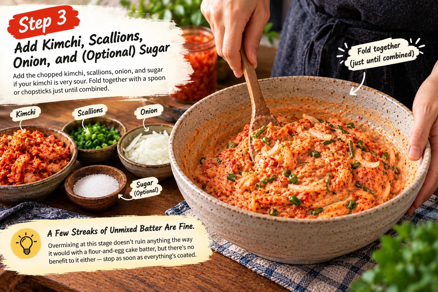 Folding chopped kimchi and scallions into pancake batter